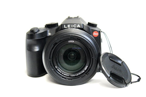 22: Leica descriptif : compact Leica 
état général : excellent état, en état de marche 
1:2.8-4.0/9.1-146
prix : 1190€ + prix de transport
