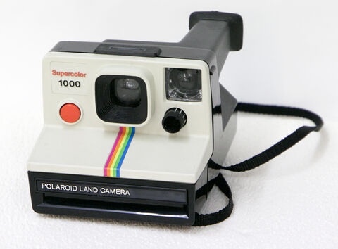 8: Polaroid Supercolor 1000 Descriptifs: 
Polaroid Supercolor 1000
Polaroid land camera
instantané
film: Polaroid SX-70
état général: correct en état de marche
Prix : 70 € ( + prix du transport)