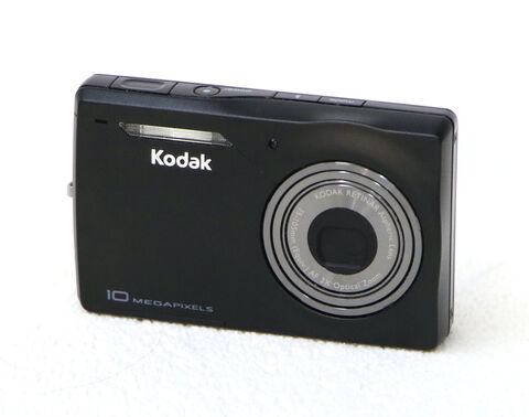 5: Kodak descriptif : compact Kodak
état général : excellent état, en état de marche 
objectif : 10 pixels 
prix : 90€ + prix de transport