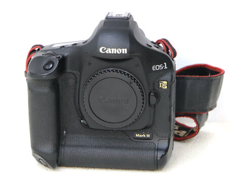 7: Canon EOS-1 descriptif : Reflex Canon EOS-1
état général : excellent état, en état de marche 
prix : 990€ + prix de transport